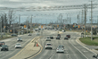 Vehicles travel along Airport Road in Mississauga, Ontario, Canada. 