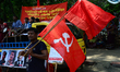 Bangladeshi garment workers and other labor organization members take part in a rally to m...