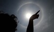 A rainbow halo is seen around the Sun in the sky atop of the eastern Indian state Odisha’s...