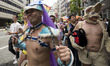 A costumed participants attends the Tokyo Rainbow Pride parade on the streets of Tokyo, Ja...