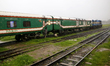  A man is trying to catch a train during the heavy rainfall in Dhaka, Bangladesh on May 21...