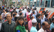 Residents wait for public transports to go home during the Ramadan in Dhaka, Bangladesh on...