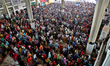 Hundreds of devotees line up at the Kamalapur Railway Station in Dhaka, Bangladesh, on 4 J...