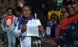 A woman with other protesters, who is taking part in the demonstration against Yarl's Wood...