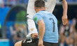 Artem Dzyuba of Russia vies Cristian Rodriguez of Uruguay during the 2018 FIFA World Cup R...