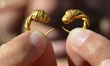 Archaeologists uncover haul of ancient gold jewellery at a Thracian tomb in Sveshtari, Bul...