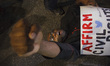 Protesters chanted as they were arrested during their blockade of fifth avenue. They prote...