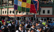 Rows of Chicago police officers surround the entrances of Wrigley Field, blocking demonstr...