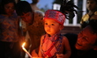  Indigenous people gather at candle light vigil ahead of International Day of the World's...
