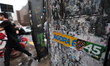 A sticker of the presidential candidate Aecio Neves is seen in a street during the second...