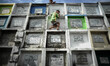 Children climb along the stacked graves at the municipal cemetery of Navotas city, north o...