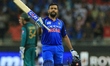 Indian cricket captain Rohit Sharma celebrates after scoring 100 runs during the Asia Cup...