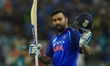 Indian cricket captain Rohit Sharma celebrates after scoring 100 runs during the Asia Cup...