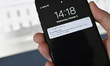 Presidential alert is displayed on the screen of an iPhone as a Wireless Emergency Alert (...