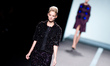 A model showcases designs by Miguel Palacios, during Mercedes Benz Fashion Week Madrid - W...