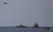 A rescue ship is seen near the location of the Lion Air flight JT610 crash during rescue o...