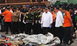 President Joko Widodo saw the debris of the plane and passenger items of Lion Air at the E...