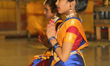 Tamil Hindu girls perform a classical Bharatnatyman dance honouring Lord Shiva during the...