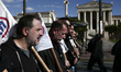 Workers and employees of the private sector take part to a protest organized by the Commun...