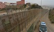 The Civil Guard car patrolling the border fence at the Morocco–Spain border in the city of...