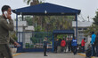 A view of the entrance to the Temporary Immigrant Stay Center near border fence at the Mor...