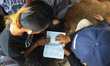 Street punk learn to read the Koran with the Sufism community under the bridge, Tebet Stat...