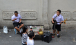 Thai student street musicians performs music near Siam Paragon in Bangkok, Thailand on Nov...