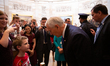 Vice President Mike Pence walks through the Capitol greeting visitors after a ceremonial s...