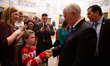 Vice President Mike Pence walks through the Capitol greeting visitors after a ceremonial s...