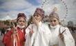  Okinawan new adults wearing kimonos posed for photo during the Coming of Age Day ceremony...