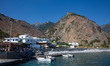 The port, the village and the wild mountains. Agia Roumeli, a little village in the southe...