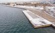 The Umbrellas sculpture installation at the new seafront. Aerial view of the snow covered...