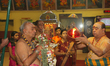 Tamil Hindu priests perform special prayers during the Thai Pongal Festival at a Hindu tem...