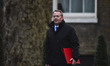 International Trade Secretary Liam Fox arrives for the weekly cabinet meeting at Downing S...