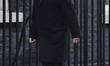 Transport Secretary Chris Grayling arrives for the weekly cabinet meeting at Downing Stree...