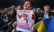Participants hold banners and flags in support of Yulia Tymoshenko, the Ukrainian politici...