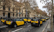 Concentration and demonstration of taxi drivers at the Gran Via street in Barcelona to pro...