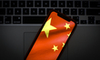 The Chinese flag is seen on a portable mobile device in this photo illustration on January...