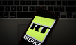 The Russia Today America logo is seen on a portable mobile device in this photo illustrati...