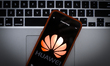 The Hawei logo is seen on a portable mobile device in this photo illustration on January 2...