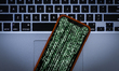 Matrix style graphics are seen on an Apple iPhone in this photo illustration on January 22...