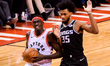  Pascal Siakam #43 of the Toronto Raptors looks up near Marvin Bagley #35 of the Sacrament...