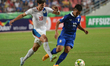 Prakit Deeporm (R) of Thailand is closed down by Phil Younghusband of Philippines during t...