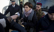 Italy, Rome: Deputy of Leu (Liberi e uguali) Rossella Muroni blocks a bus carrying migrant...