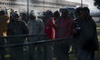 Italy, Rome: Migrants wait to leave Castelnuovo di Porto migrants center, some 10 kilomete...