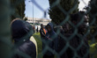 Italy, Rome: Migrants wait to leave Castelnuovo di Porto migrants center, some 10 kilomete...