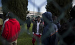 Italy, Rome: Migrants wait to leave Castelnuovo di Porto migrants center, some 10 kilomete...