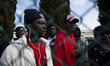 Italy, Rome: Migrants speak to the press as they wait  to leave Castelnuovo di Porto migra...