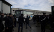 Italy, Rome: Migrants leave by bus Castelnuovo di Porto migrants center, some 10 kilometer...
