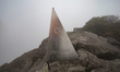 The metal pyramid in the peak of Fansipan mountain. Fansipan mountain in Vietnam with the...
